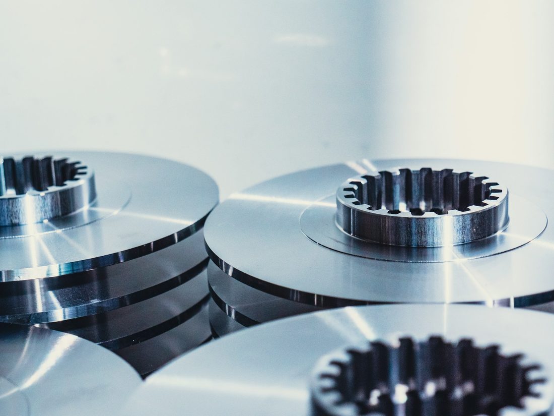 Flange and disc-shaped part