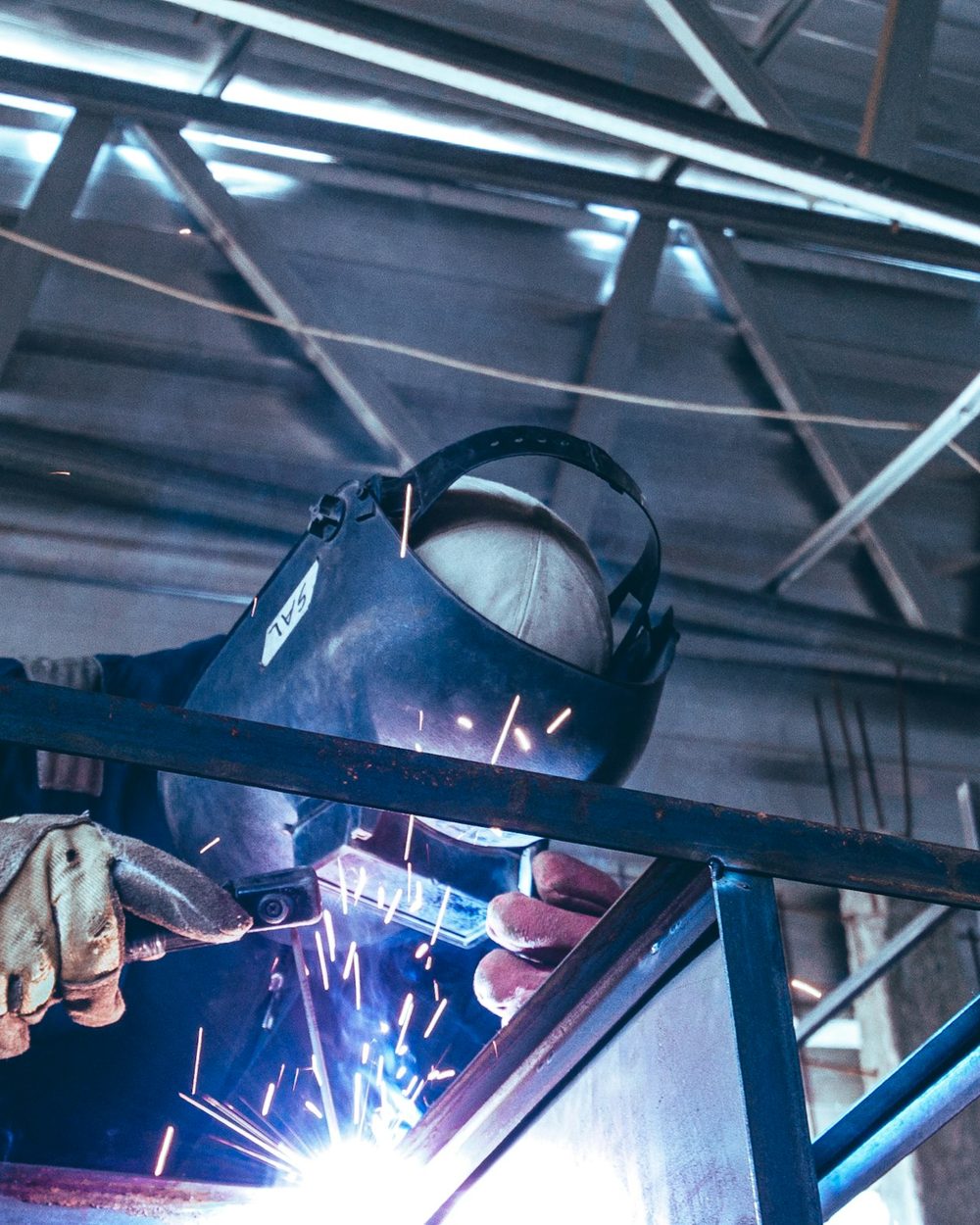 Welder working on a steel structure